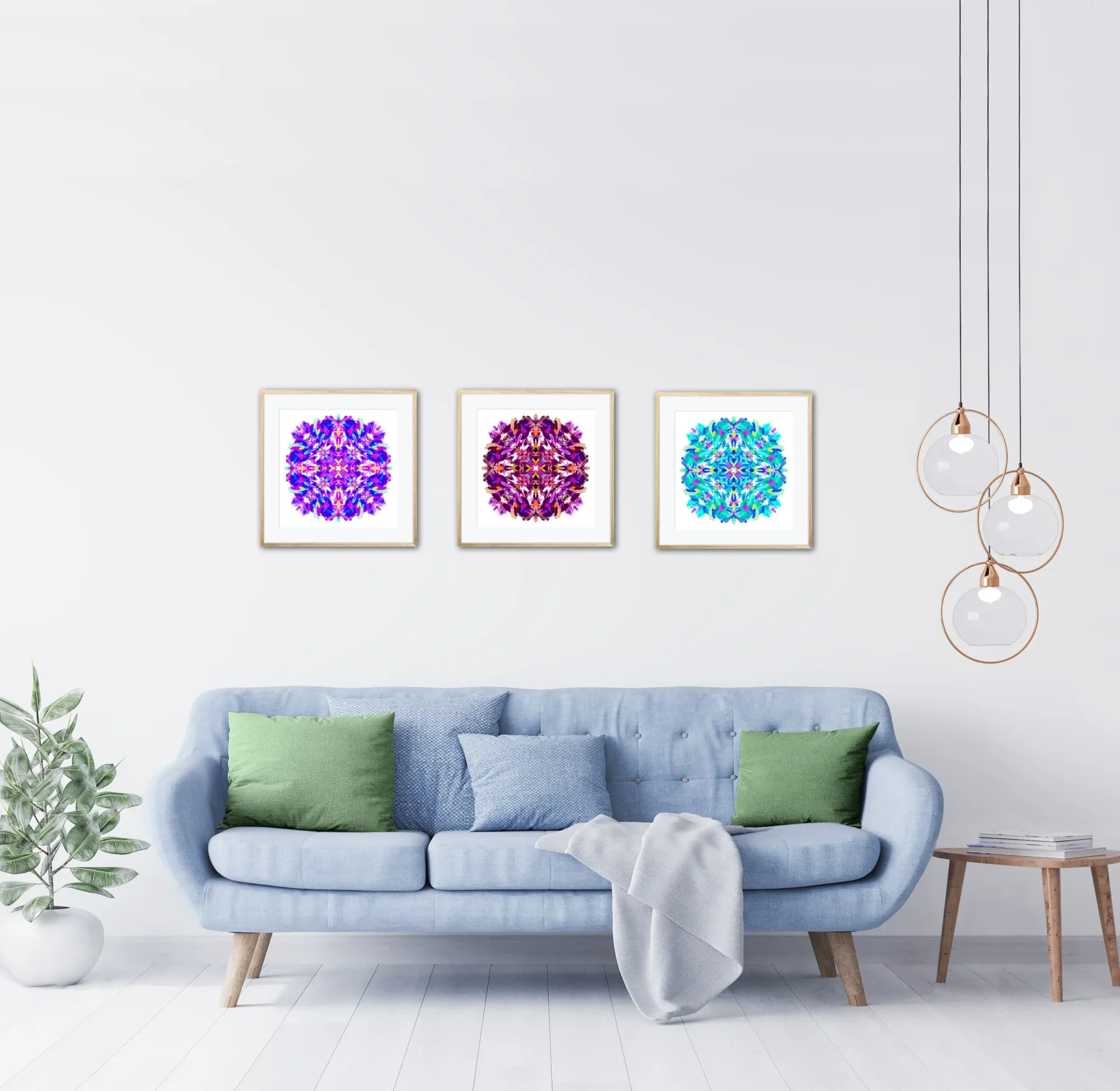 Set of three bright mandala wall art prints with original paintings in modern room